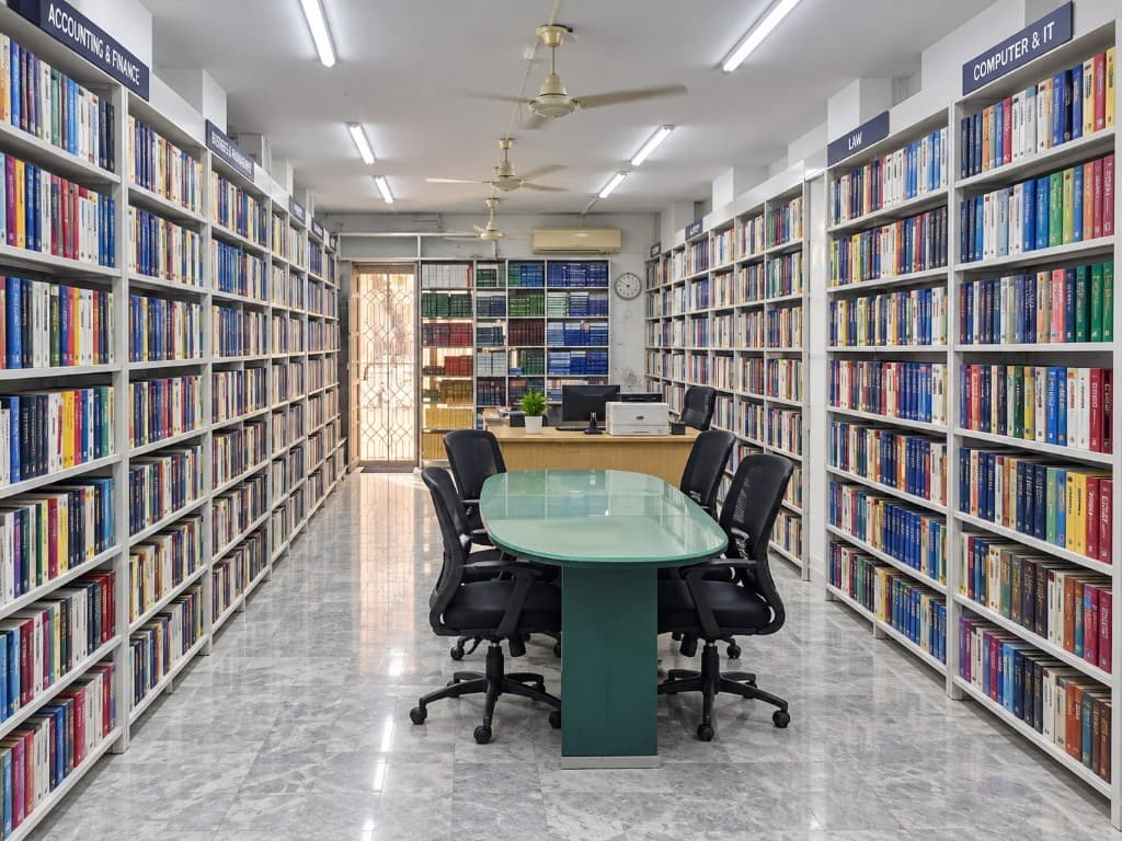 Allied Book Co. reading room with Accounting, Business, Law, and Computer shelves