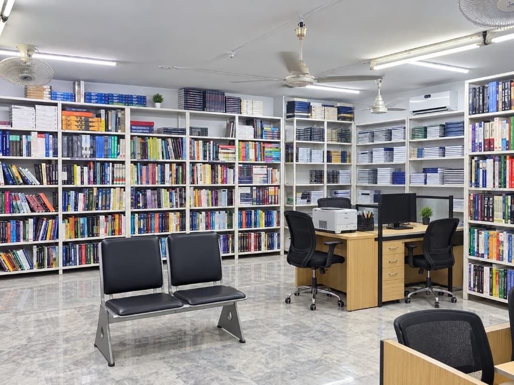 Allied Book Co. interior with bookshelves, desk, and waiting area